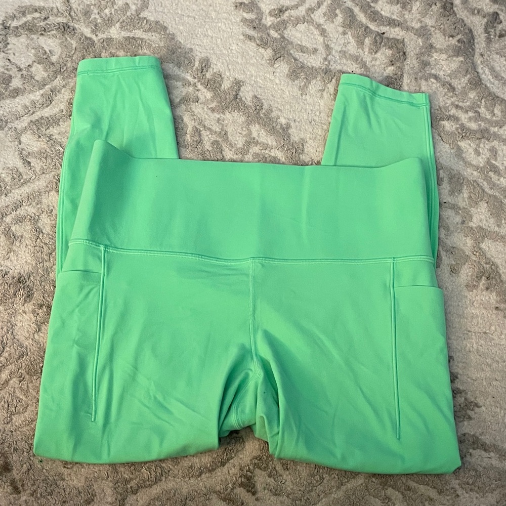 Athleta Salutation stash tight Mint Green Leggings size large petite